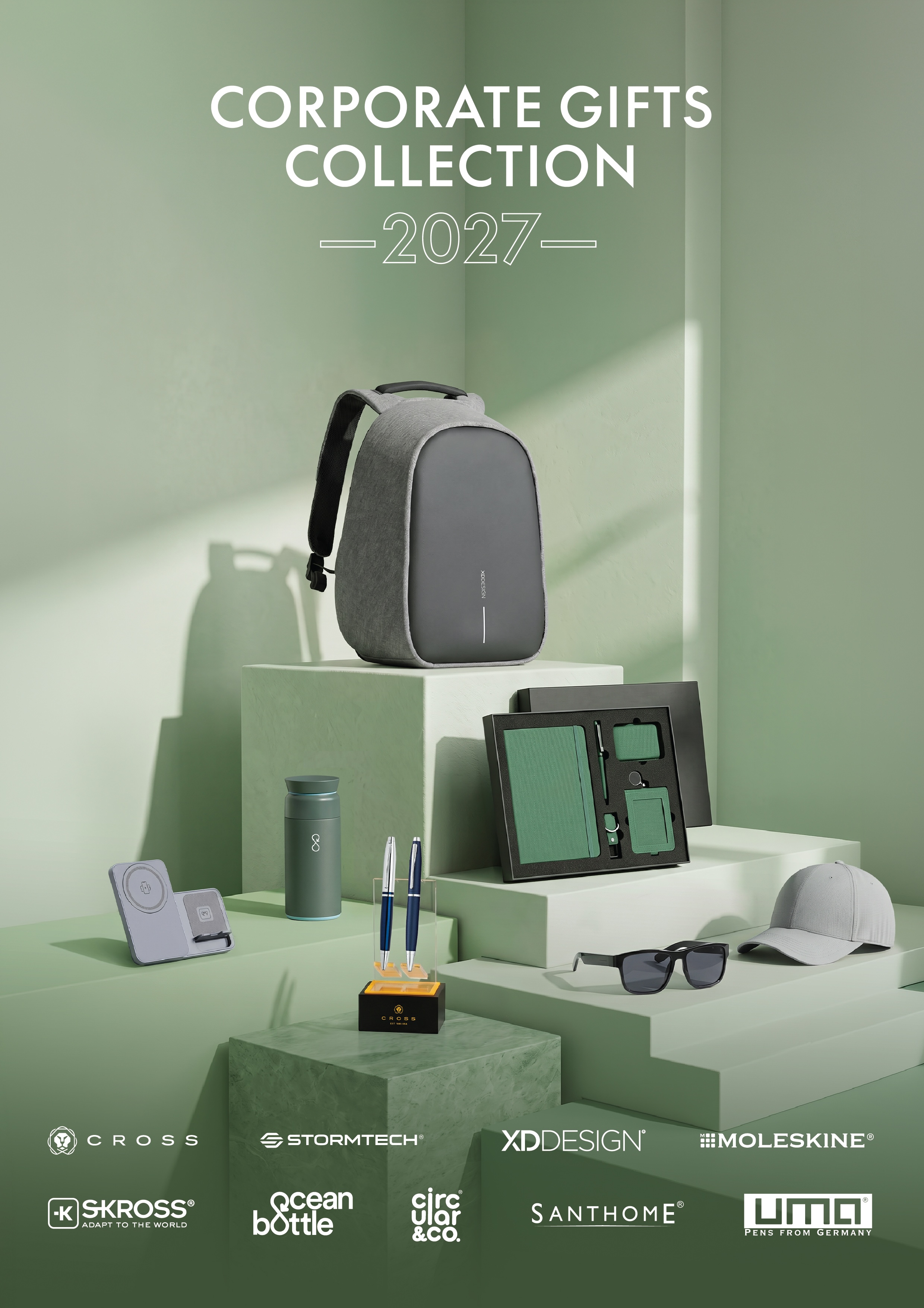 A coordinated corporate gift collection with a boxed notebook set and drinkware
